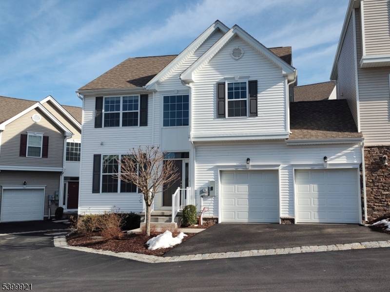 Wow ! Newer construction 2021 Builder's Canterbury model with high ceilings, open concept, deck off main level, rich hardwood first floor and much more !