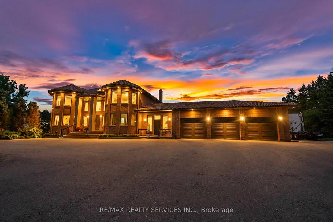 Welcome To This Magnificent Custom Built Estate In The Prestigious Castlemore Community, Newly Renovated and Situated On a Beautifully Landscaped 2 Acre Lot Surrounded By Mature Trees.