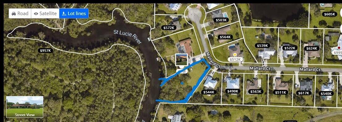 BUILD YOUR DREAM HOME ON THIS BEAUTIFUL OCEAN ACCESS WATERFRONT LOT ON THE ST LUCIE RIVER WITH APPRX 140' OF WATERFRONT.