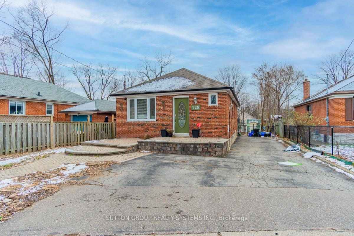 Charming, Fully Renovated All Brick Bungalow in the Vibrant Kerr Village !