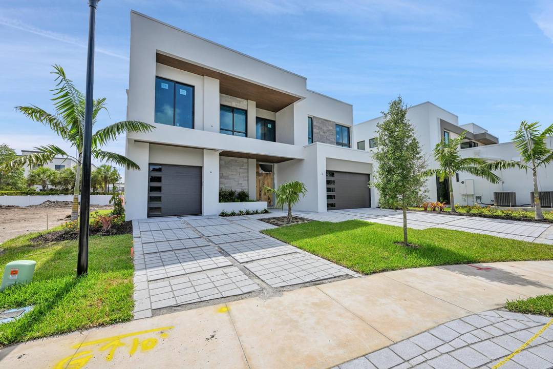 This stunning, new construction home in the heart of Delray Beach blends modern luxury with tranquility.