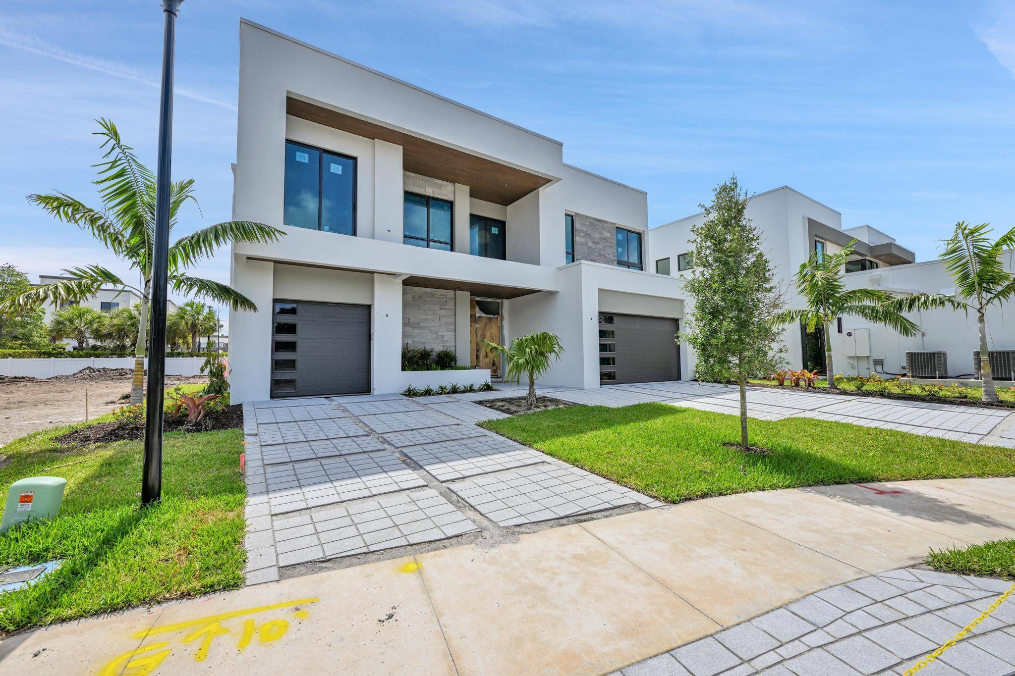 This stunning, new construction home in the heart of Delray Beach blends modern luxury with tranquility.