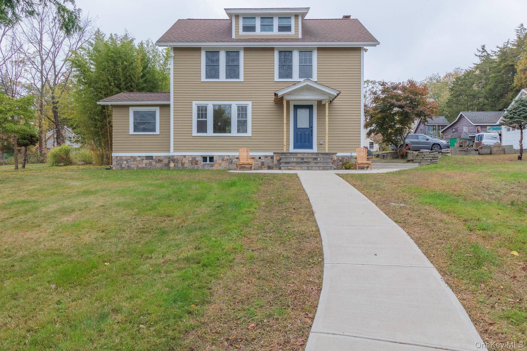 This completely renovated Colonial home for rent offers a seamless blend of timeless character and modern comfort, set on a beautifully cornered lot.