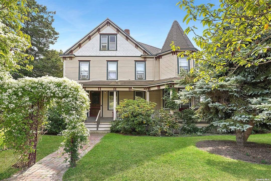 This beautiful Queen Ann Victorian home includes a priceless location in the heart of Greenport Village.