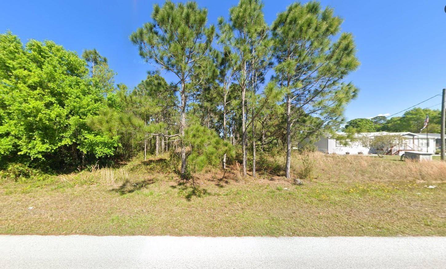 Build or bring your dream home on this 0.