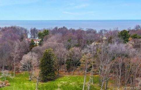 Incredible opportunity to build your dream estate on a legal, 2 acre vacant lot in the prestigious Short Beach enclave of Nissequogue.