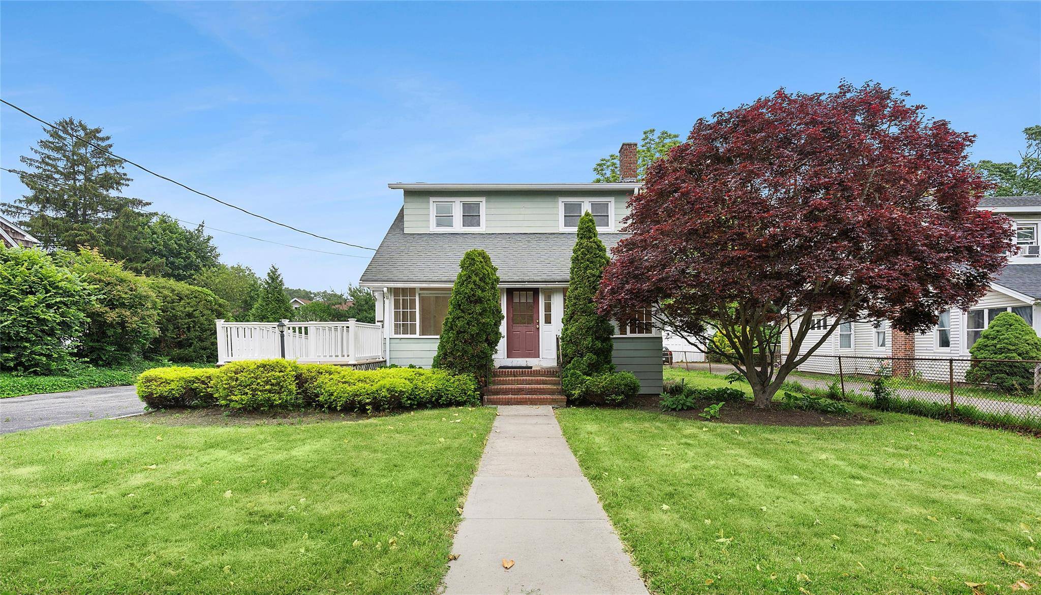 Welcome to 1018 Roanoke Ave, a unique mixed use property located in the heart of Riverhead, close to Peconic Bay Medical Center and the Route 58 traffic circle.