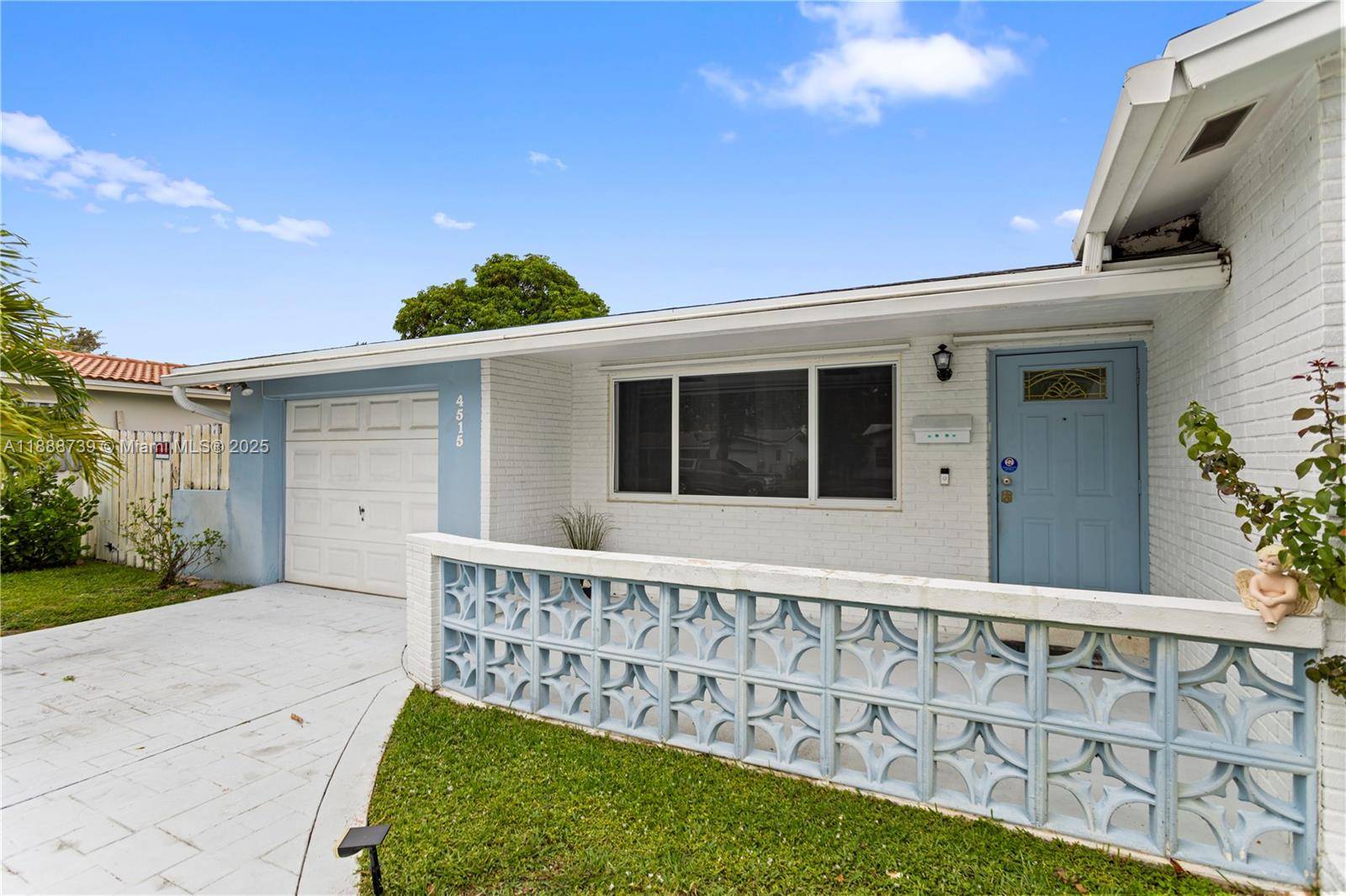 Discover the allure of one of Hollywood Hills' most beautifully maintained streets with this home.