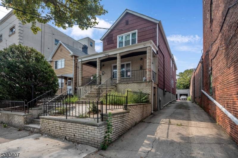 This Won't Last Bayonne Two family with Bonus Unit 3 Car Garage Parking !