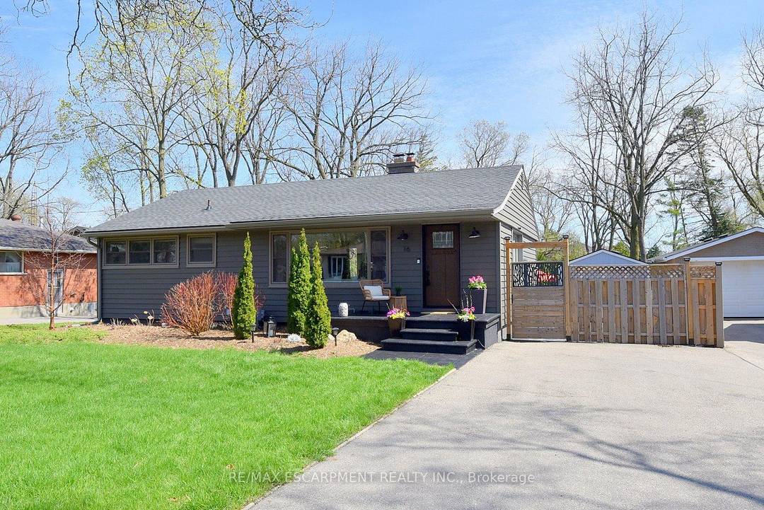 Don't miss this beautifully renovated, modern farmhouse bungalow in the heart of quaint downtown Waterdown.