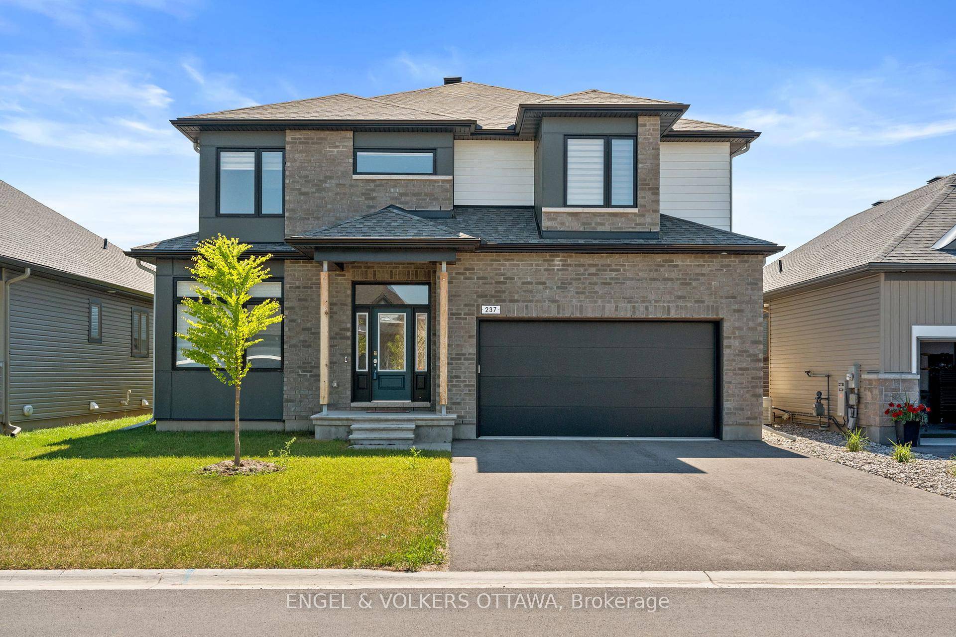 Welcome to this stunning executive 6 bedroom, 5 bathroom home in the prestigious golf course community of Equinelle.
