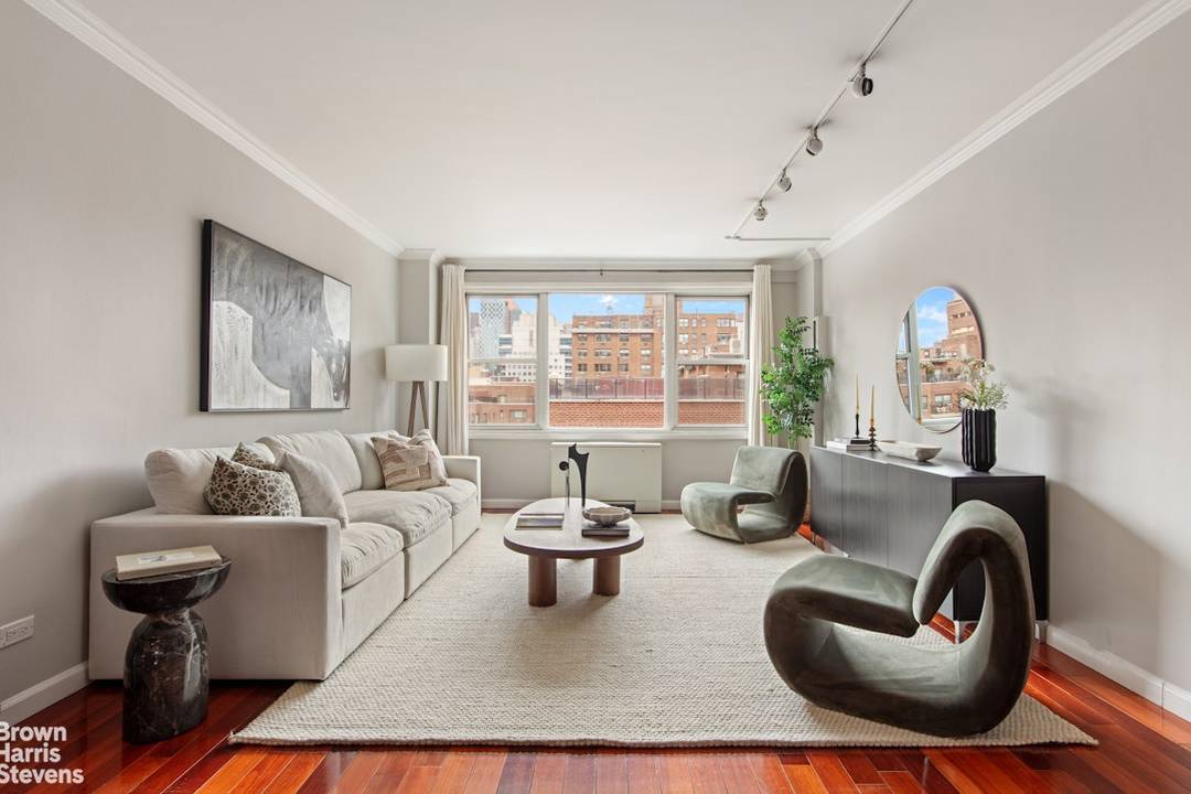 BACK ON MARKET ! This light filled, oversized one bedroom, one bathroom home offers open northern and western exposures with wide city views in a full service building in the ...