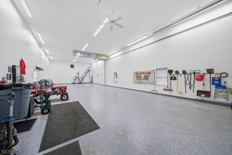 Nestled on a beautifully maintained one acre property in Randolph, this truly one of a kind ranch offers the perfect blend of comfort, space, and versatility.