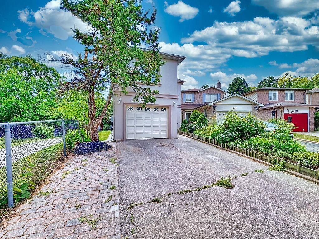 Welcome to 100 Greenbelt a thoughtfully maintained home nestled in the prestigious North Richvale community of Richmond Hill.