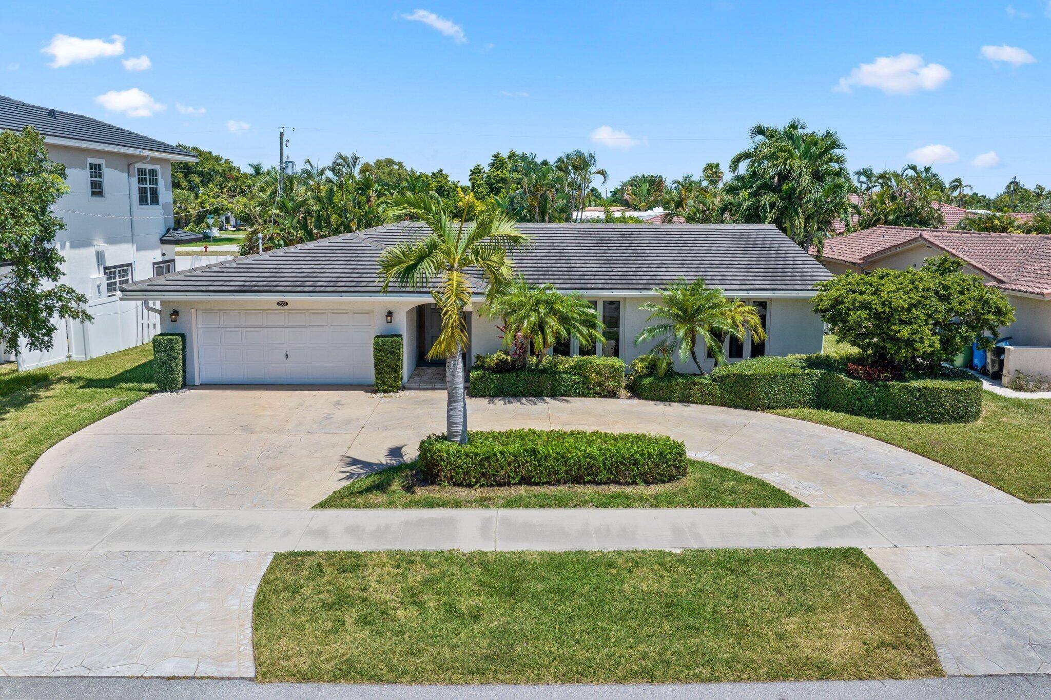 This beautifully maintained four bedroom, two bathroom split bedroom home is located in the heart of Coral Ridge and offers exceptional style and comfort.
