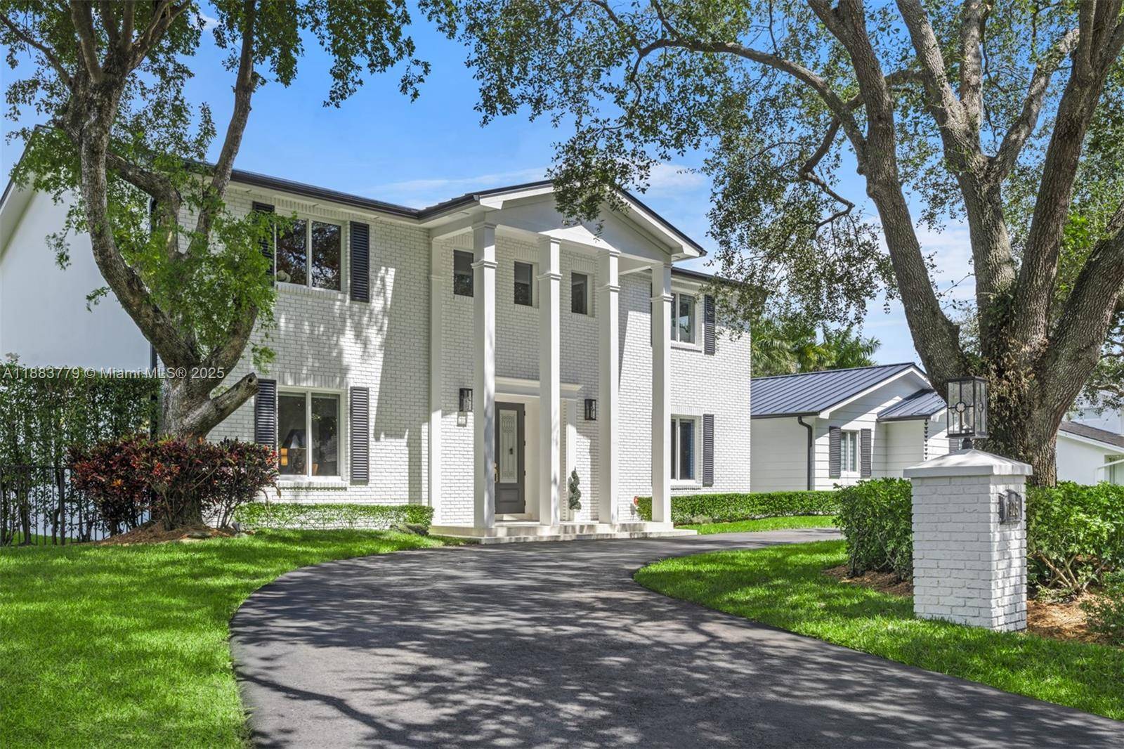 Set on a 21, 344 sq ft lot, this stately Colonial style estate seamlessly blends timeless architecture with modern sophistication.
