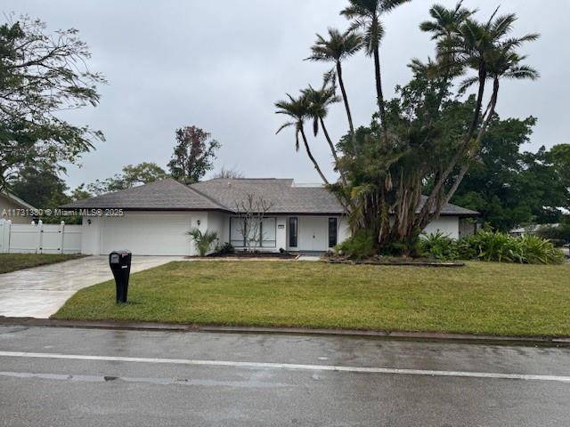 This 3 B R, 2 Bath, pool home with 2 car garage is in one of Fort Myers nicest established communities.