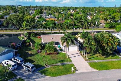 Beautiful 4 bedroom, 2 bath home with new roof 2024, located in a no HOA community in a prime location in West Palm Beach, FL.