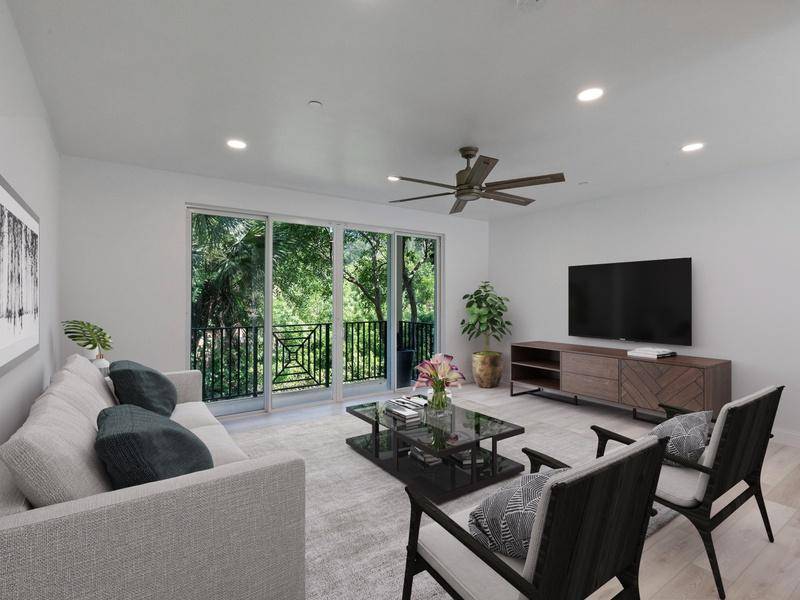 Walk to the Beach ! Renovated Stunning END unit townhome with newer kitchen, baths, flooring, cabinetry, stainless appliances, countertops, tile, fixtures, lighting, blinds, paint, etc.