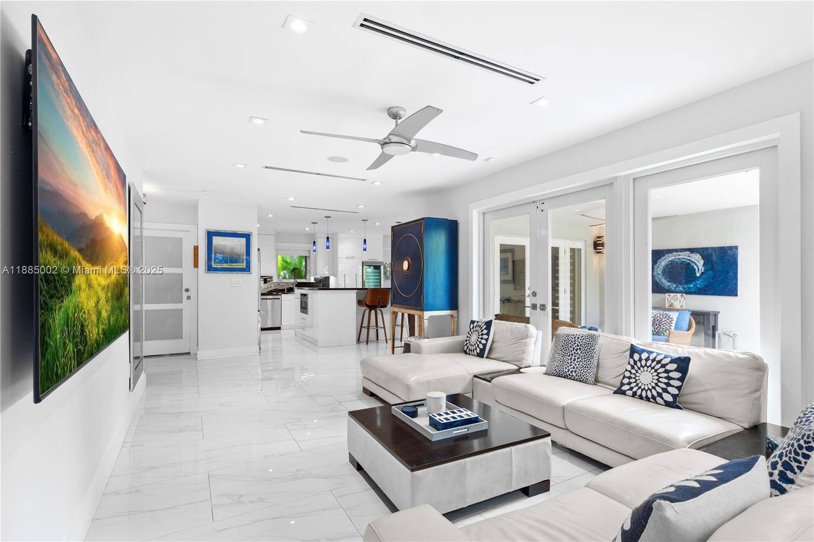 Exquisite turn key Coral Gables 3 bed 2 bath home plus den office set on a tranquil, tree lined street.