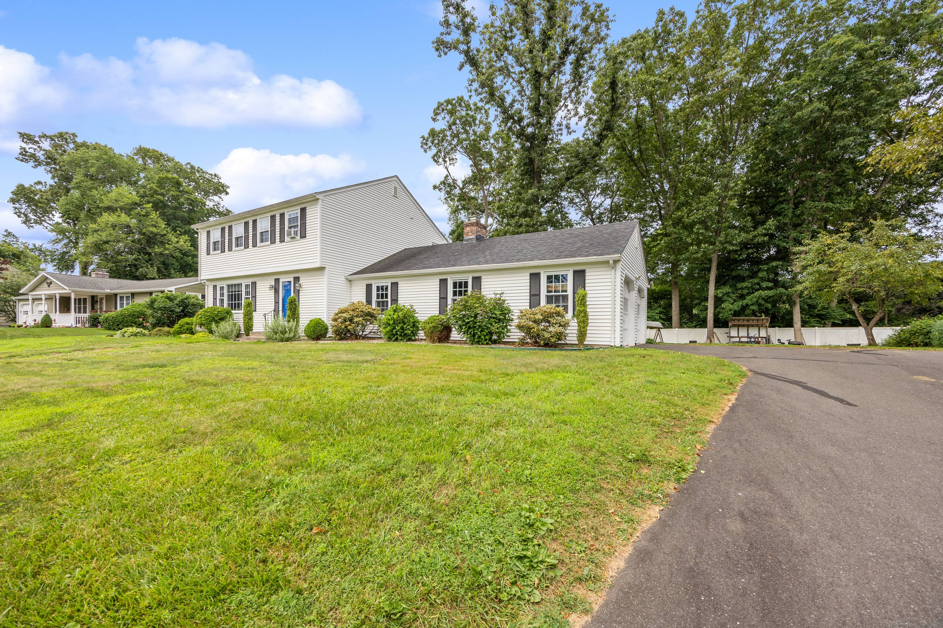 Impeccably maintained Colonial located in one of Cheshire's most desirable neighborhoods !