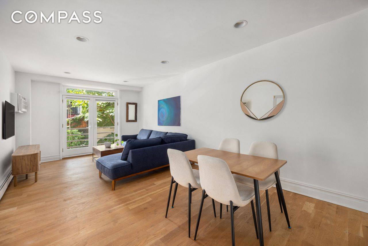 Make your home in the heart of Williamsburg in this turnkey two bedroom, two bathroom condominium featuring a wonderful open layout, lovely finishes and a Juliet balcony.