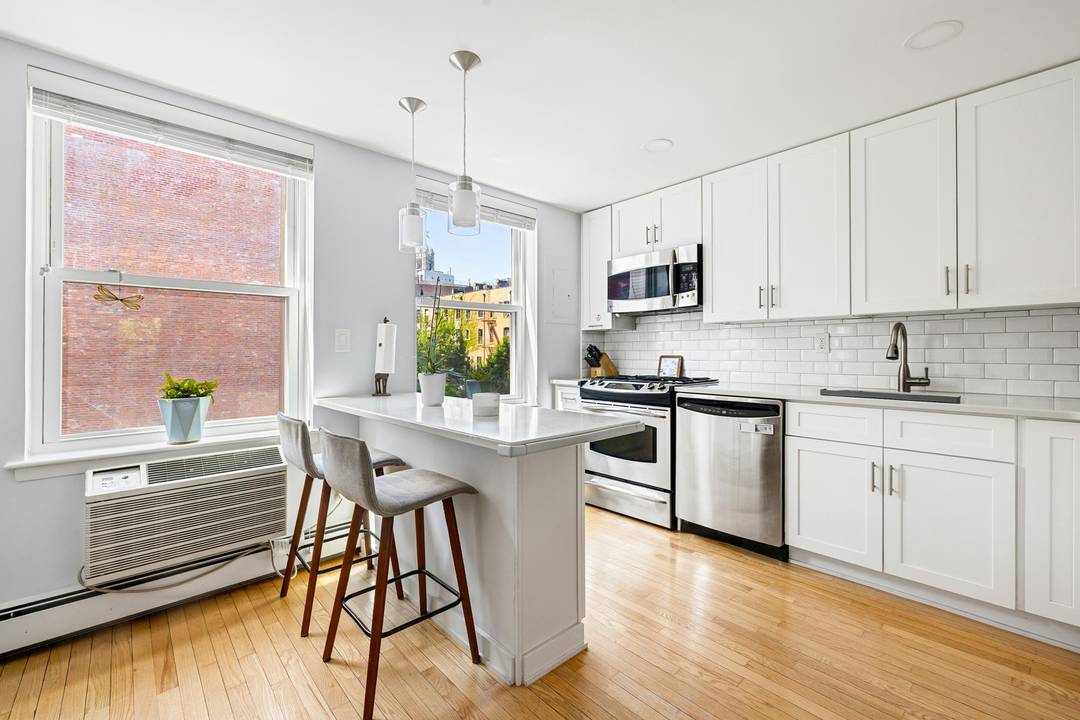 Beautifully renovated two bedroom duplex with one and a half bathrooms at the St Charles Condominium.