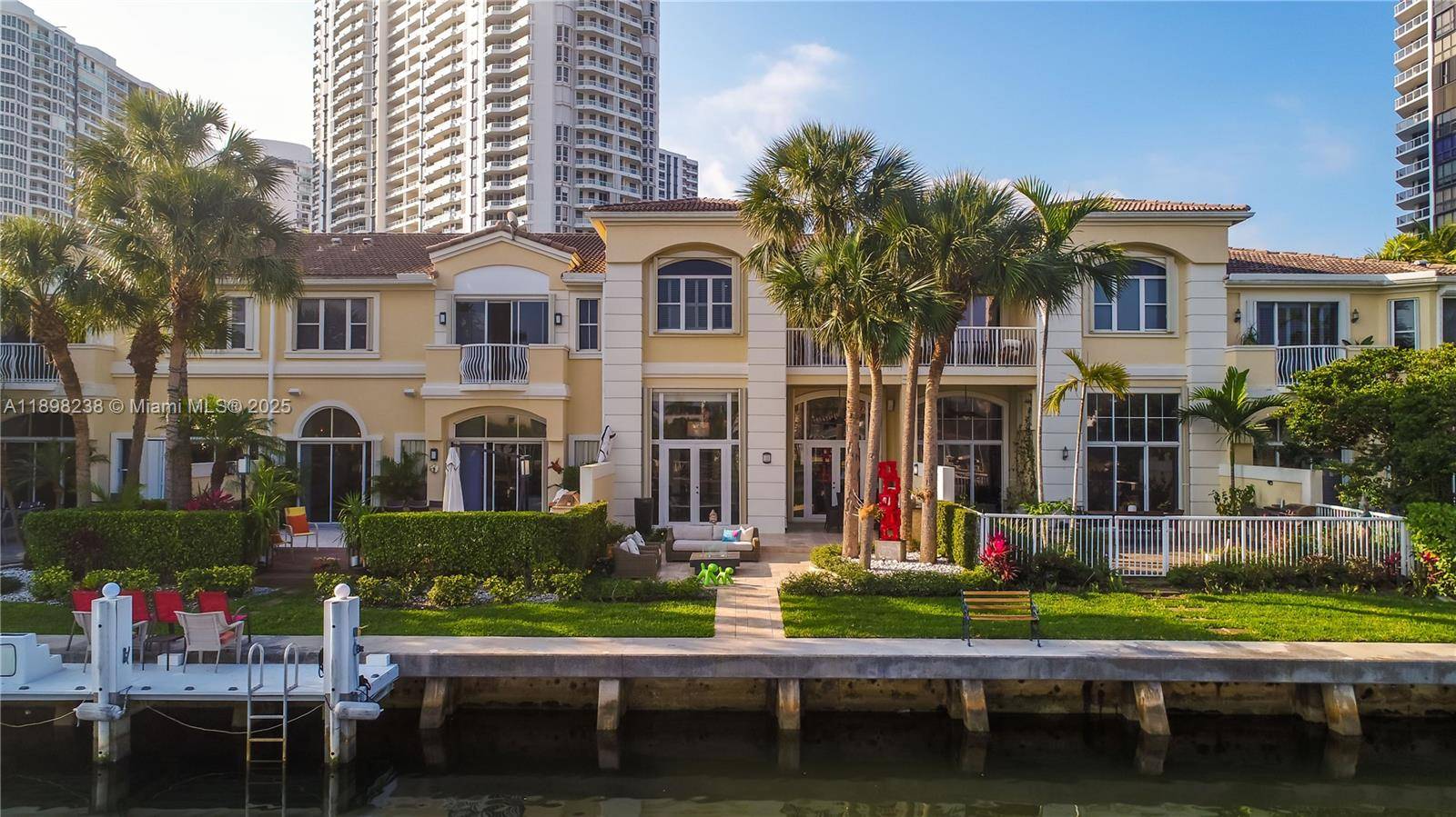 Welcome to an exclusive waterfront residence in The Courtyards at The Point !