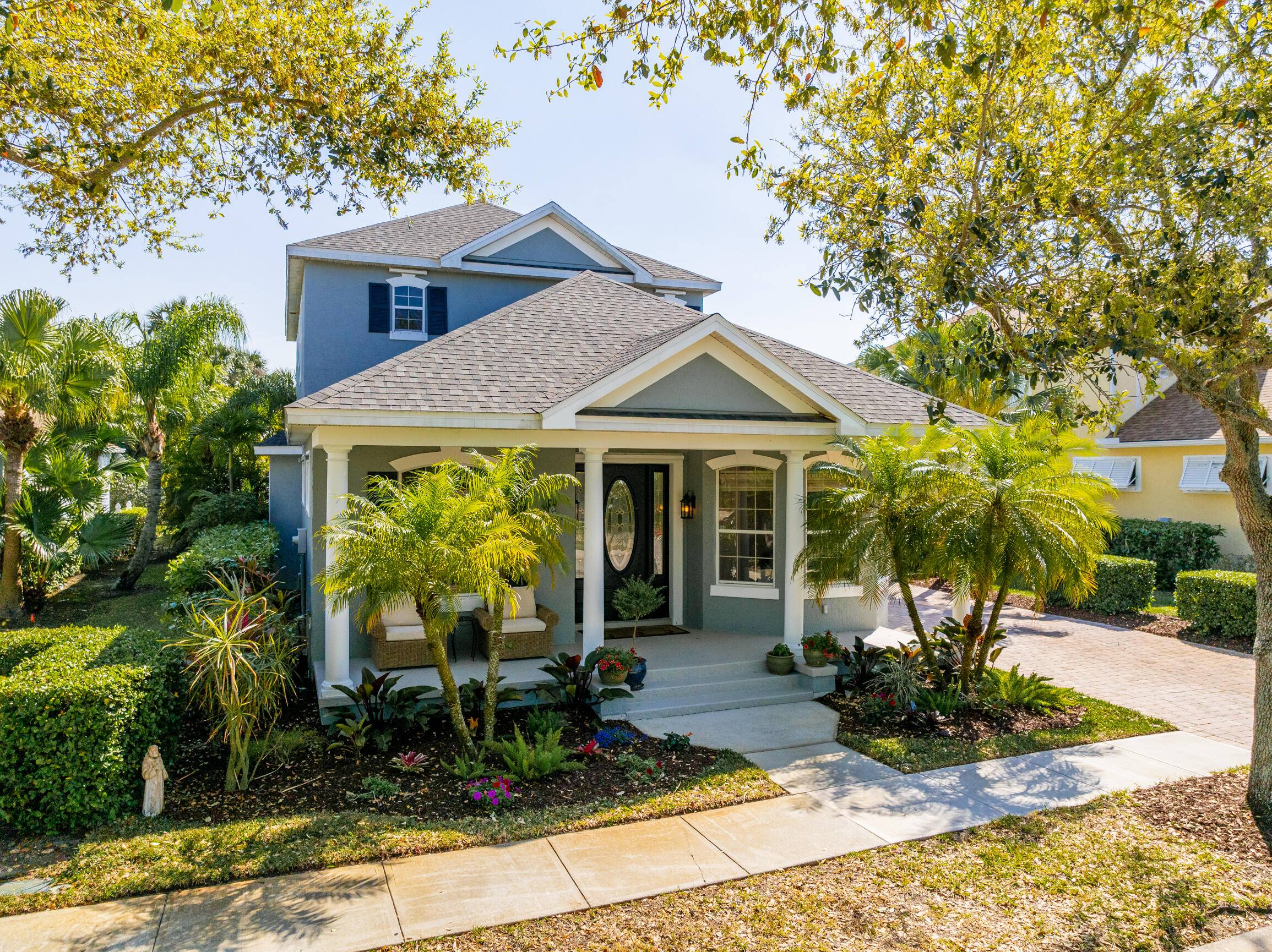 One of a kind Plantation style home boasts views of the 9th fairway in Pointe West Central Village !