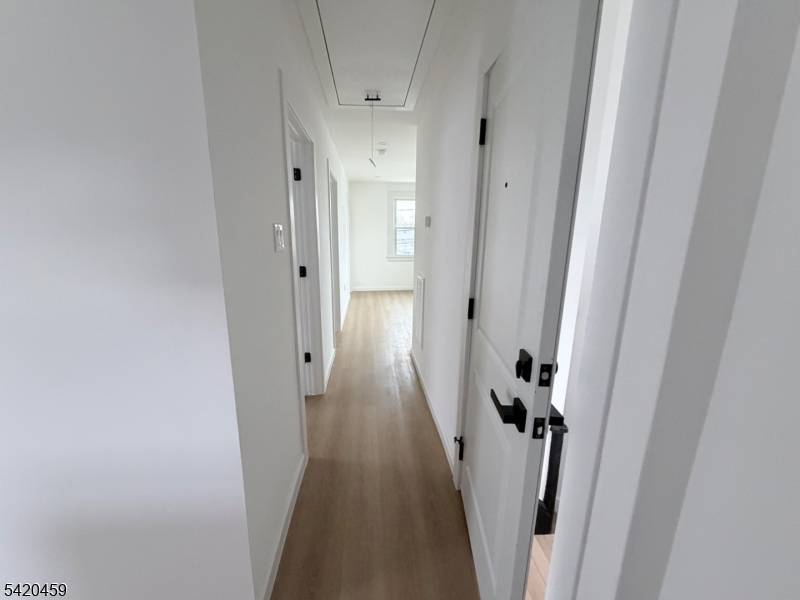 Welcome to this beautifully fully renovated two family home, offering the perfect blend of modern upgrades and income producing potential.