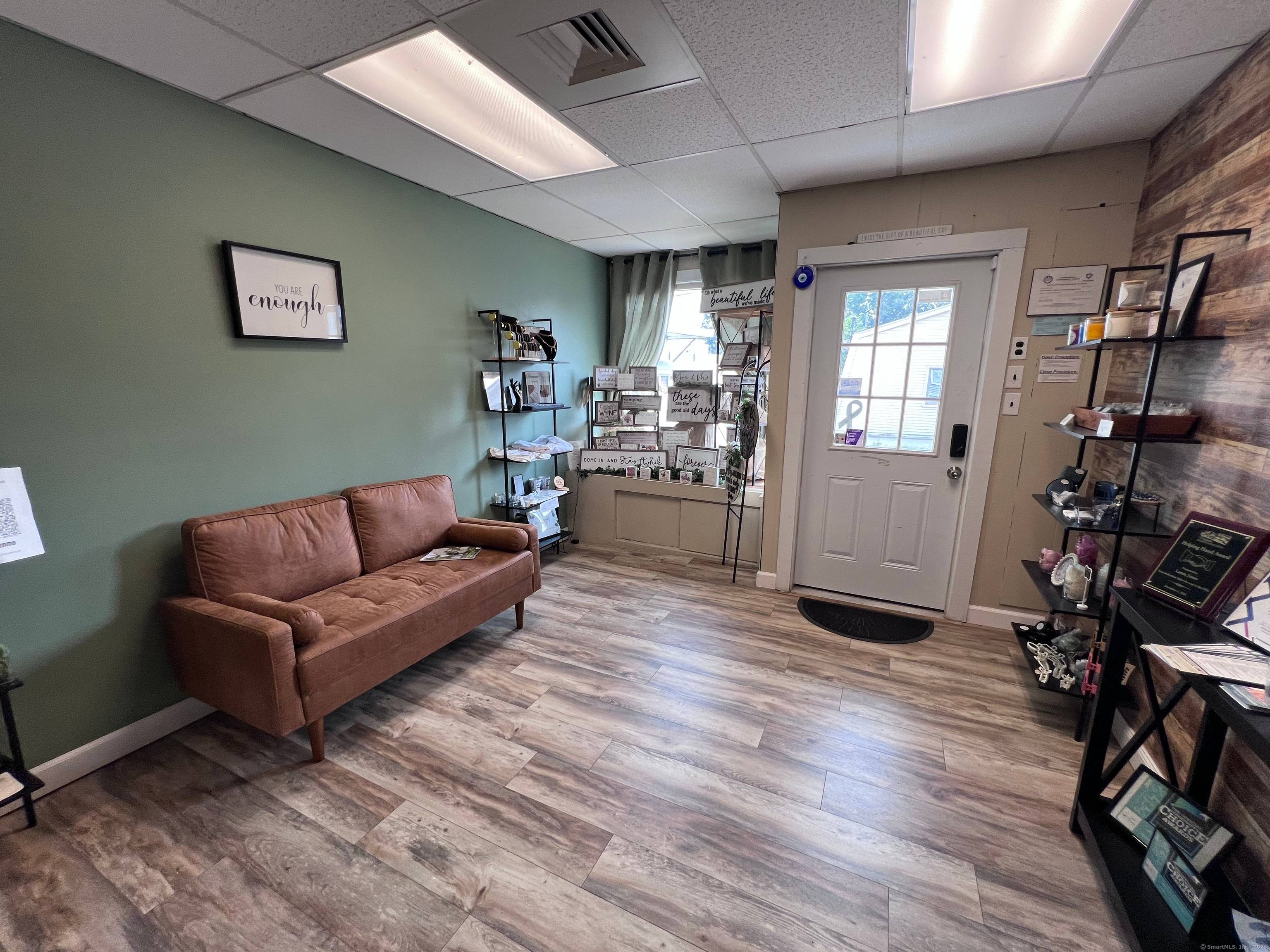Don't miss this rare chance to own a versatile 5 unit mixed use building in the heart of a rapidly growing town.
