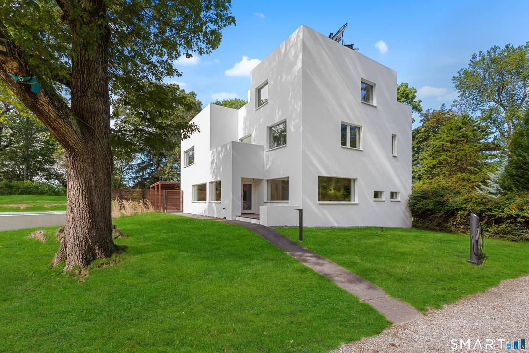 This Westport residence is a meticulously executed Passive House retrofit of a modernist concrete home originally built in 1938.