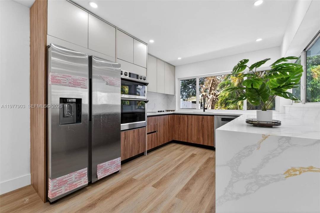 Welcome to this stunning waterfront retreat in the heart of Miramar, fully renovated from top to bottom and ready to impress from the moment you walk in.