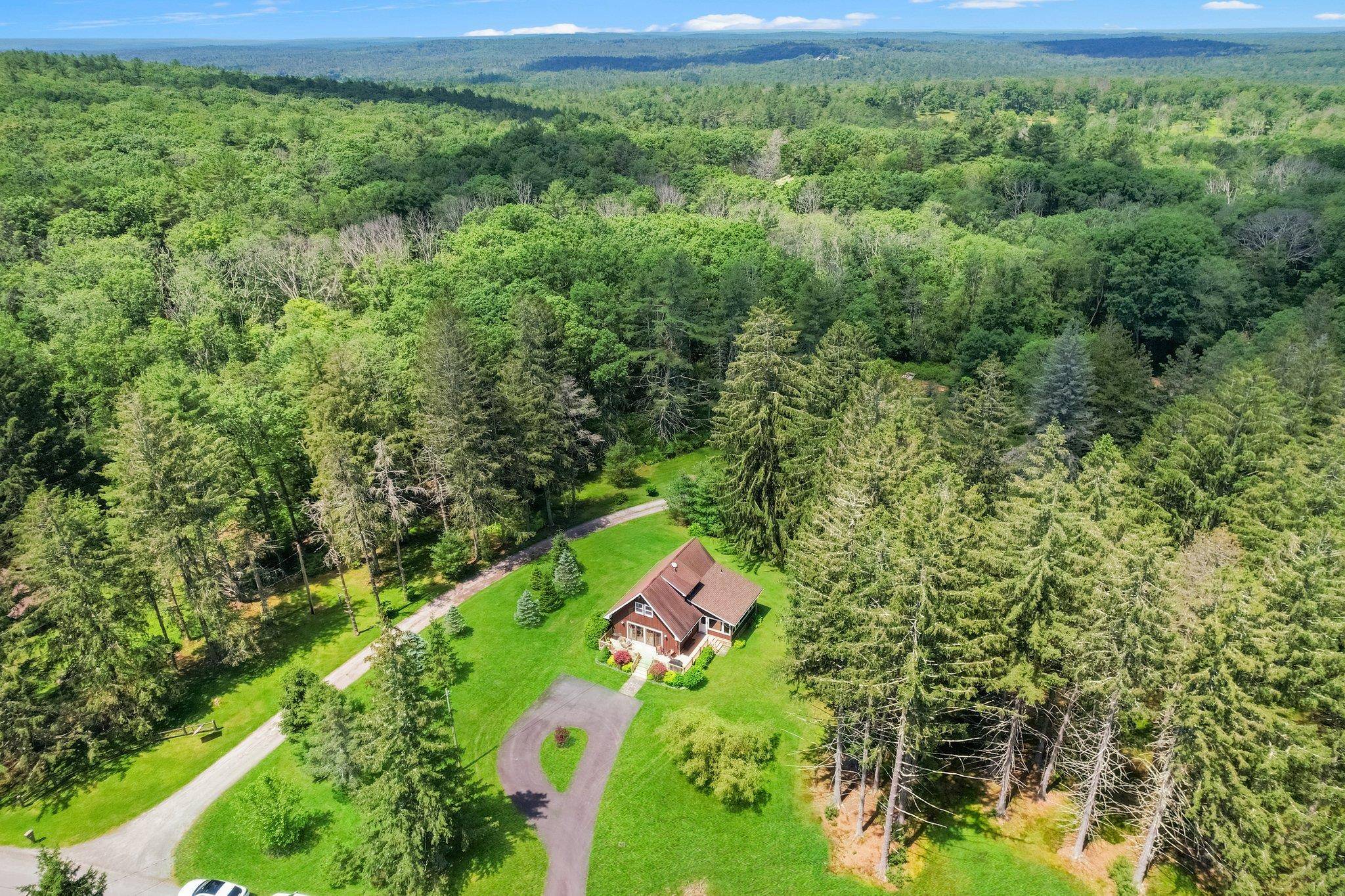 Wow ! Beautiful and Pristine Custom Home with separate lakefront parcel and lakefront dock on Highland Lake NY totaling over 4 acres !