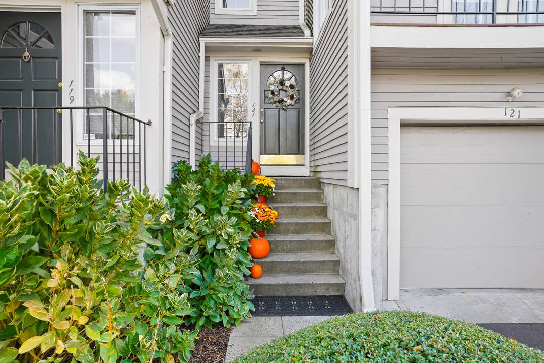Welcome to 121 Paugusett Circle, a spacious and sun filled townhome located in the desirable Churchill South community.