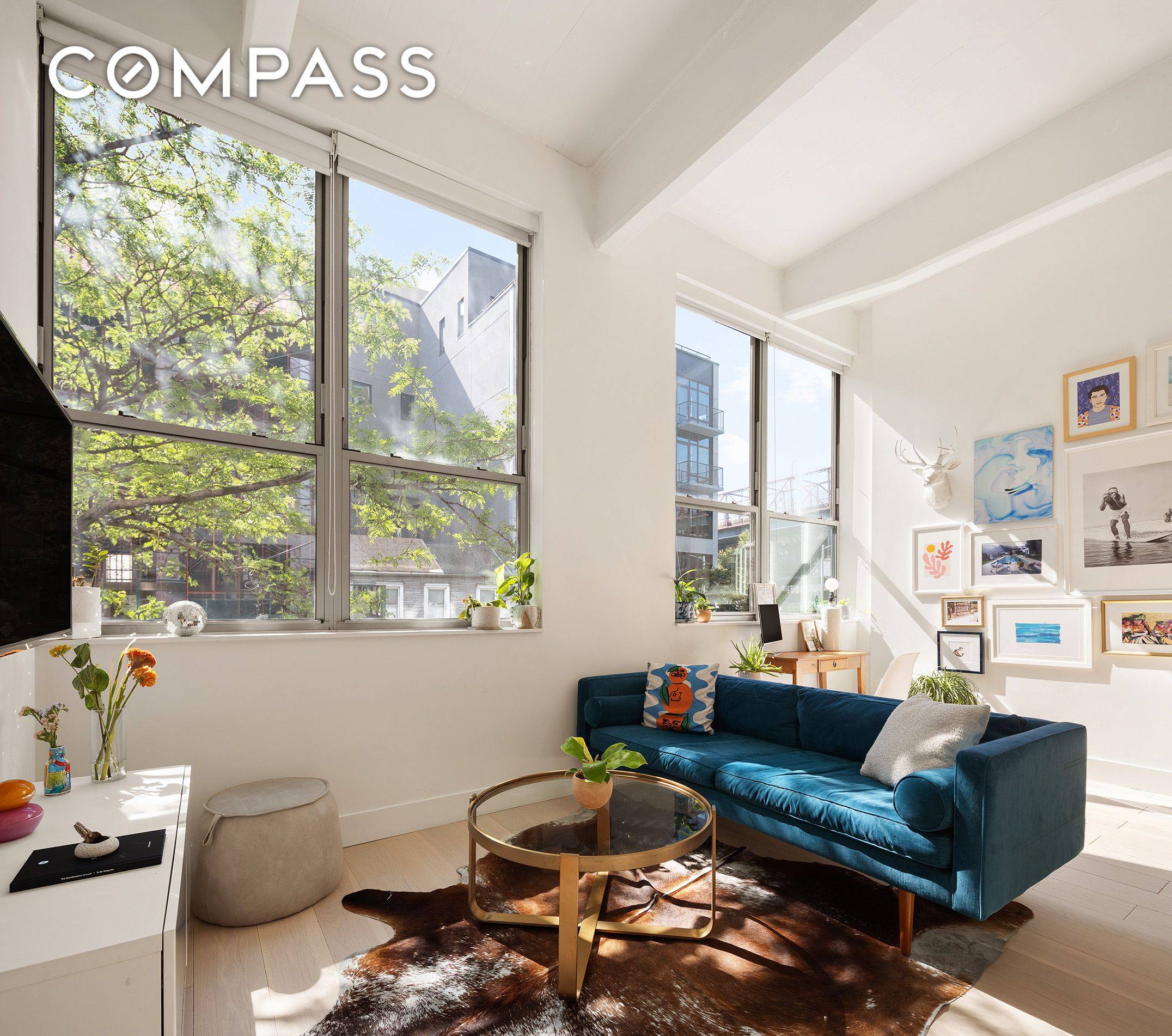 Welcome home to residence 2G at 338 Berry Street, a former factory converted to a full service, 60 unit loft condominium.