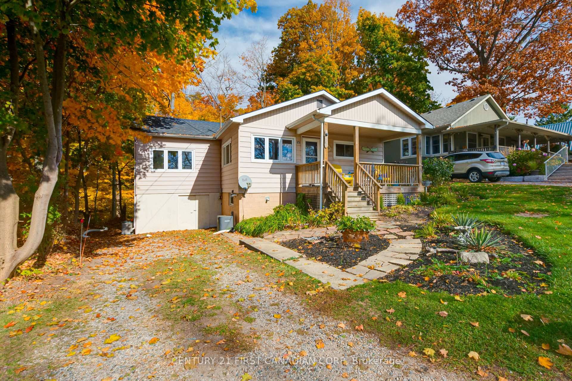 Stunning views of the water, situated on a ravine lot !