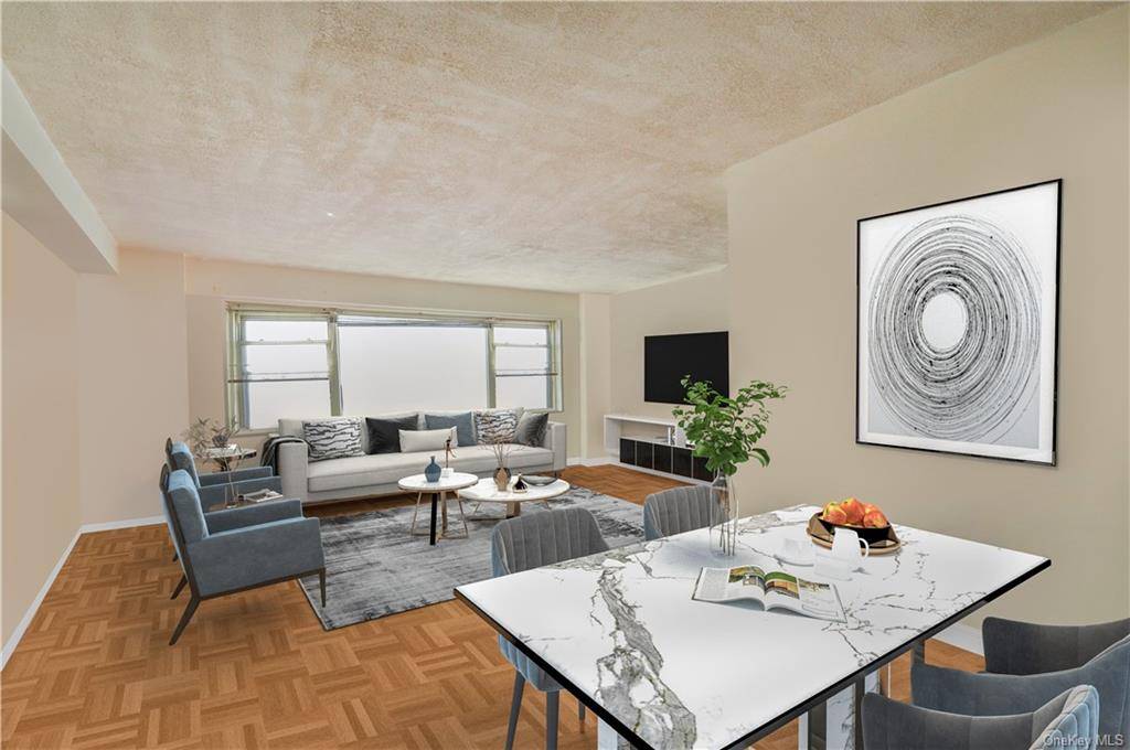 This spacious 1 bd apartment boasts a lovely garden view that fills the large living space with incredible sunlight.