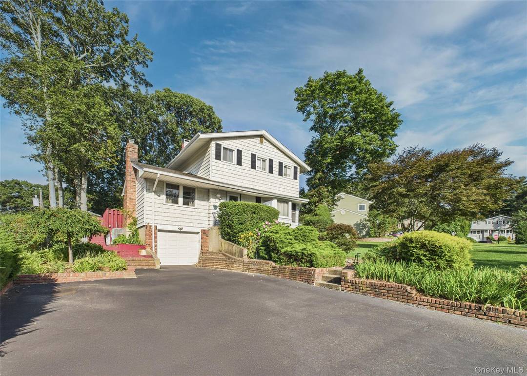 Beautiful Well Maintained Colonial w Many Upgrades in the Heart of Kings Park.