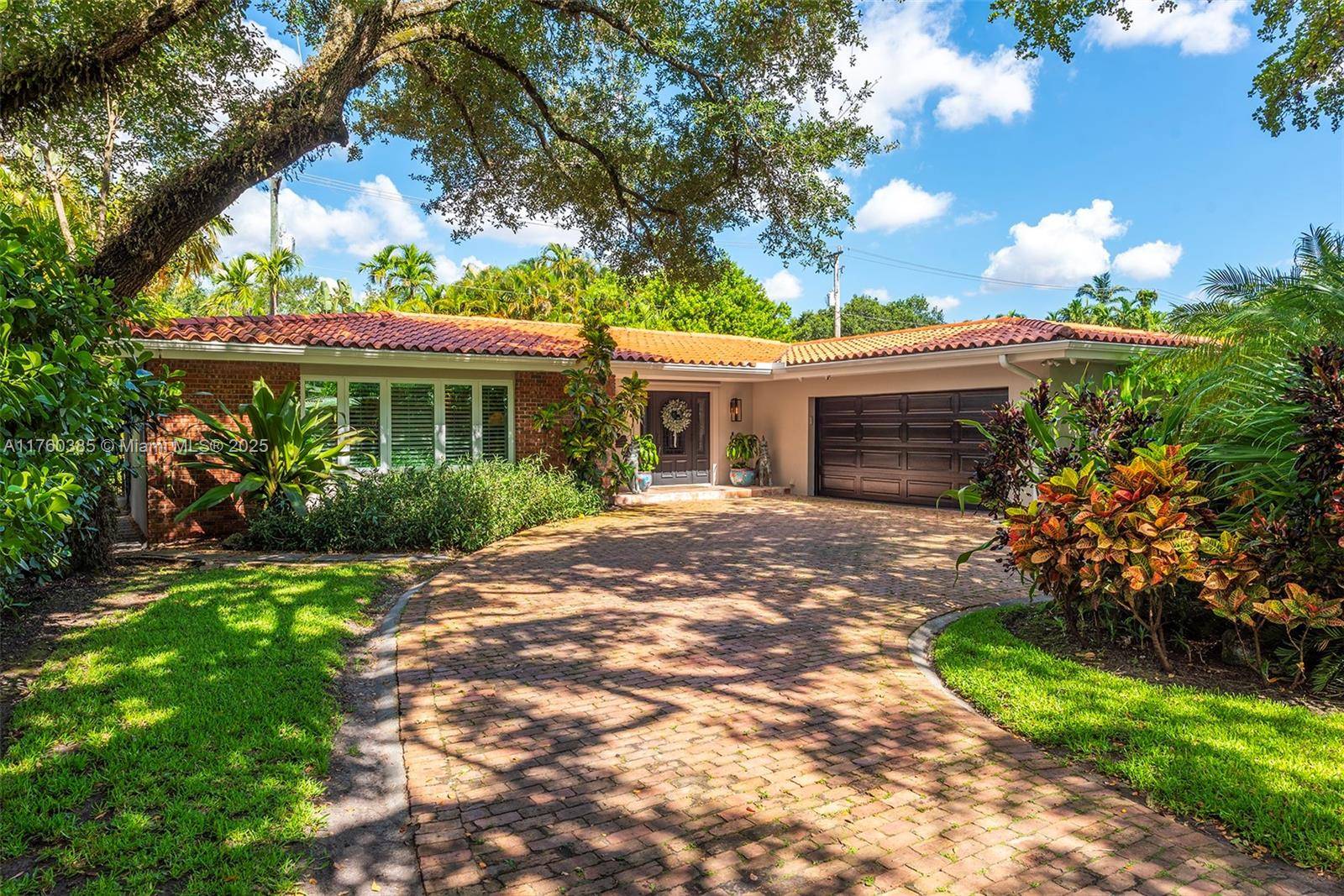 Ideally located on a quiet, tree lined street in North Coral Gables, this impeccably maintained 4 bed, 3 bath home offers comfort and versatility.