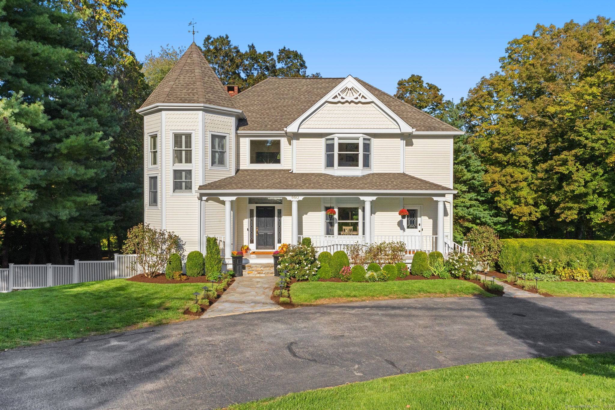 Nestled on a country road in the heart of New Canaan, this classic 1989 Colonial offers 5, 094 sq.