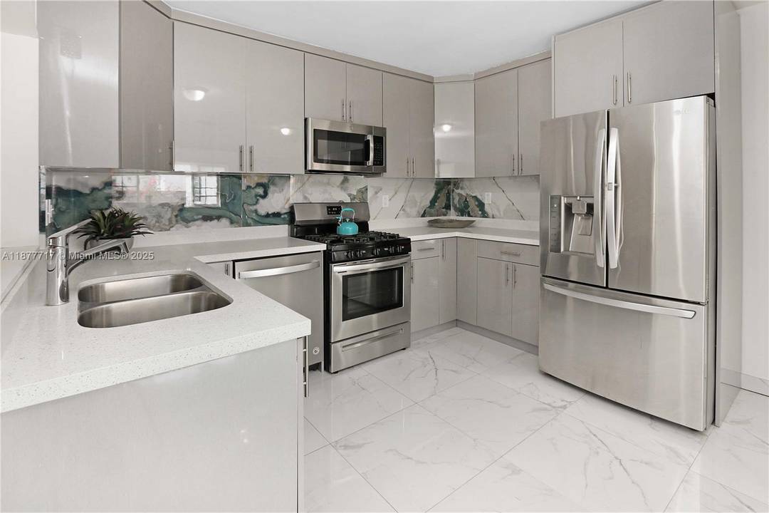 Charming and versatile 3 bedroom, 2 bath home on a flexible layout with guest quarters or easy single family use.