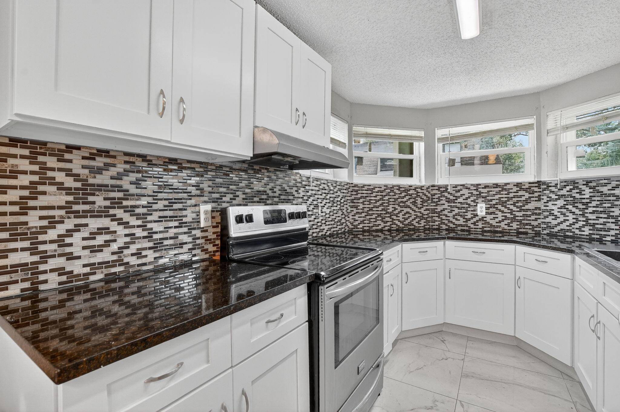 Charming 2 Bed, 2 Bath Townhouse in Prime Boca Raton LocationWelcome to this beautifully maintained 2 bedroom, 2 bath townhouse nestled in a quiet and friendly Boca Raton neighborhood.