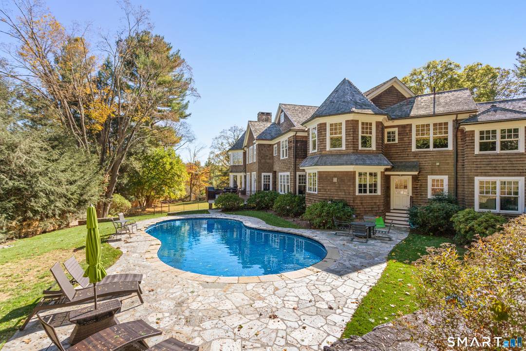 Set in a coveted estate enclave prized by CEOs and captains of industry, this exceptional, shingle style residence embodies timeless architecture, extraordinary craftsmanship, and meticulous attention to detail.
