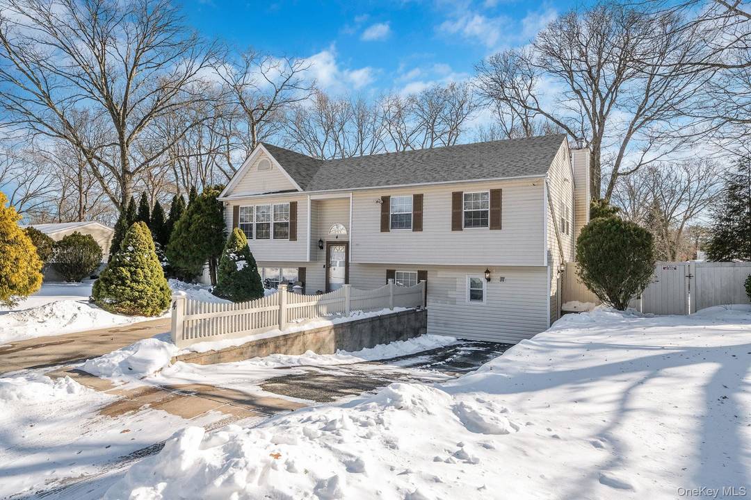 Welcome Home to this meticulously maintained Hi Ranch built in 1999, offering 2418 sq ft of refined living Space.