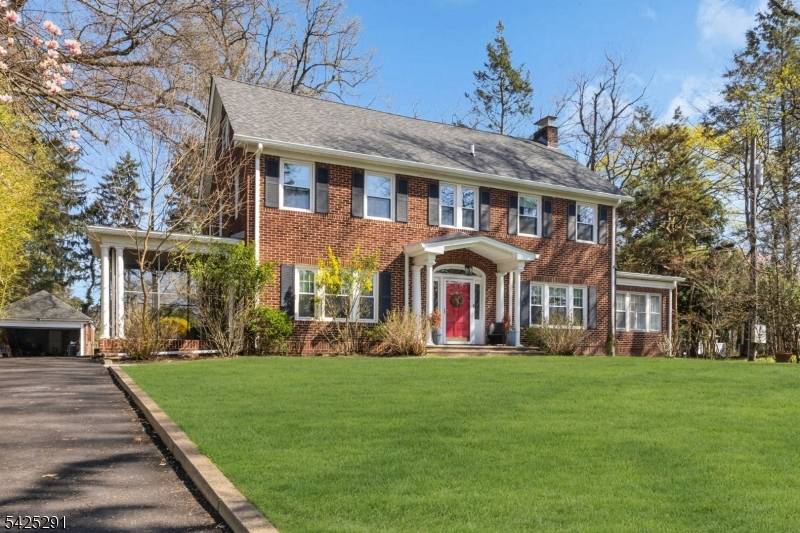 Set on a generous property within the sought after Montrose Park Historic District, this distinguished center hall Colonial offers a seamless blend of classic design and modern refinement.