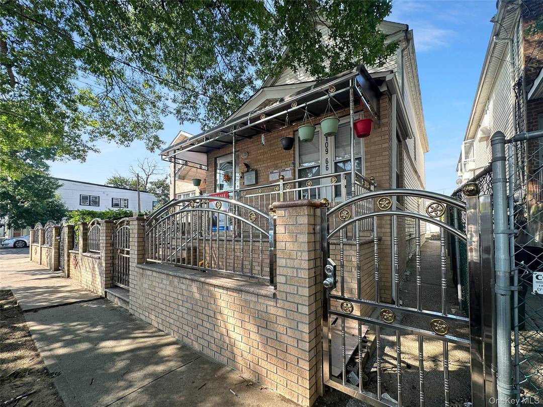 Welcome to 109 66 153rd Street a beautifully renovated single family Colonial residence nestled in a quiet, tree lined neighborhood of Jamaica, Queens.