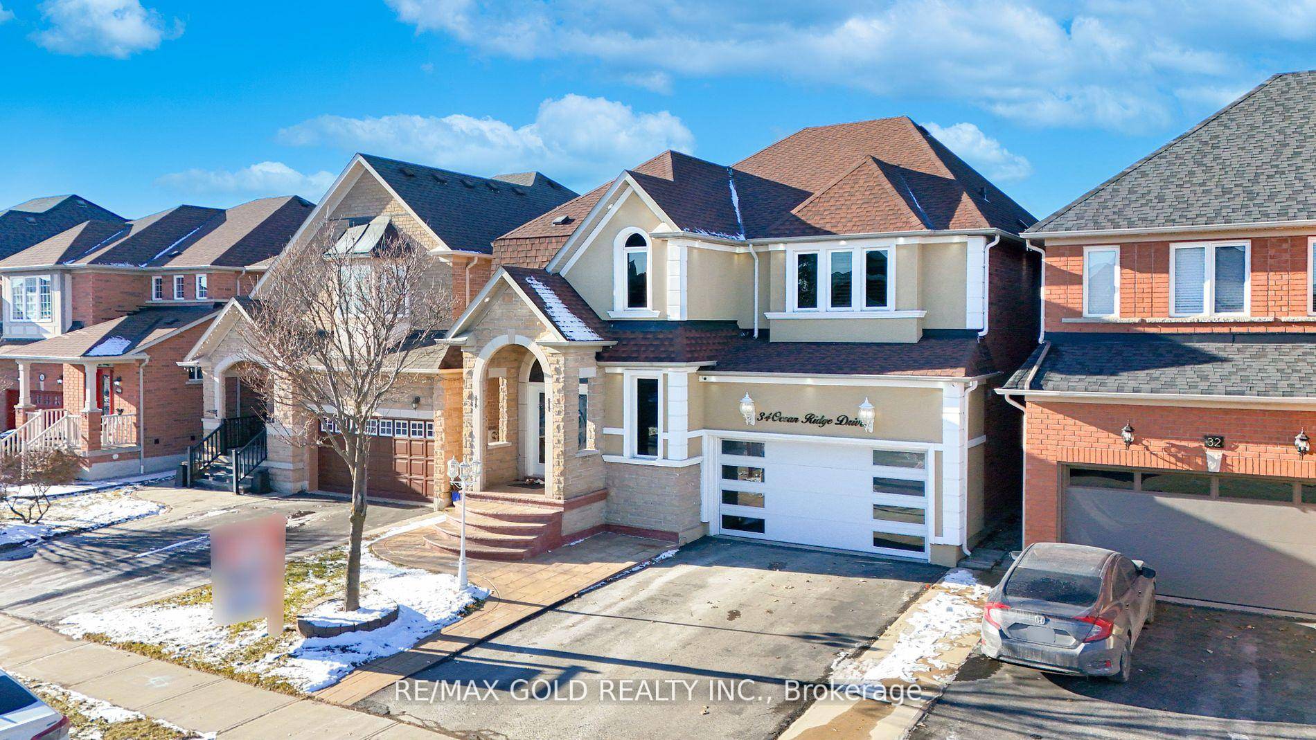 This FULLY UPGRADED detached home features a brick, stone, and stucco exterior, with substantial investments enhancing its curb appeal.