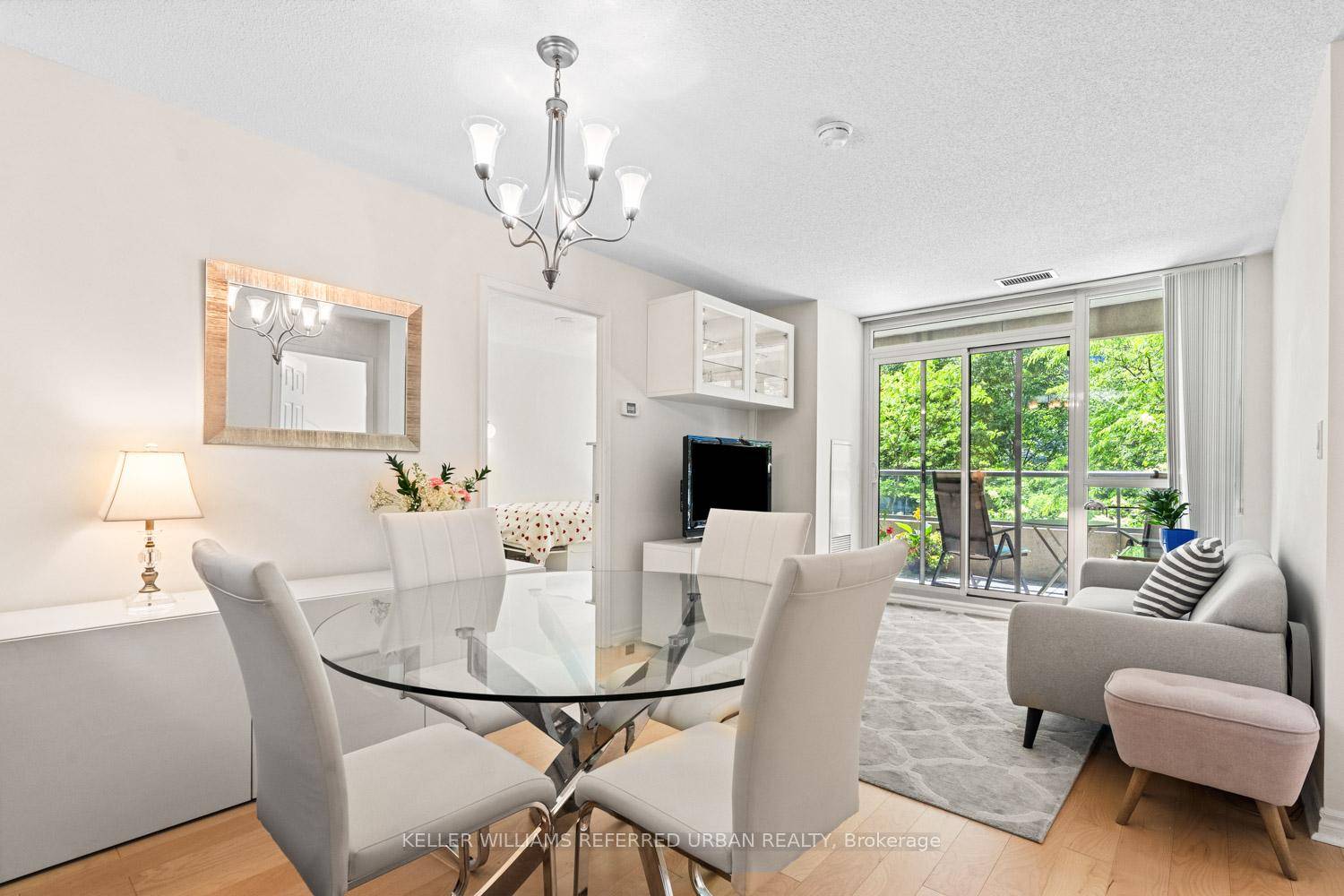 Welcome to 211 35 Hollywood Ave, a beautifully updated 2 bedroom, 2 bathroom condo offering a rare split floorplan layout and an expansive west facing terrace overlooking the tranquil courtyard.
