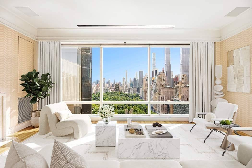 Perched high above Central Park at One Central Park West, this sun flooded corner residence has been meticulously upgraded to the highest standard and boasts expansive vistas of Central Park ...
